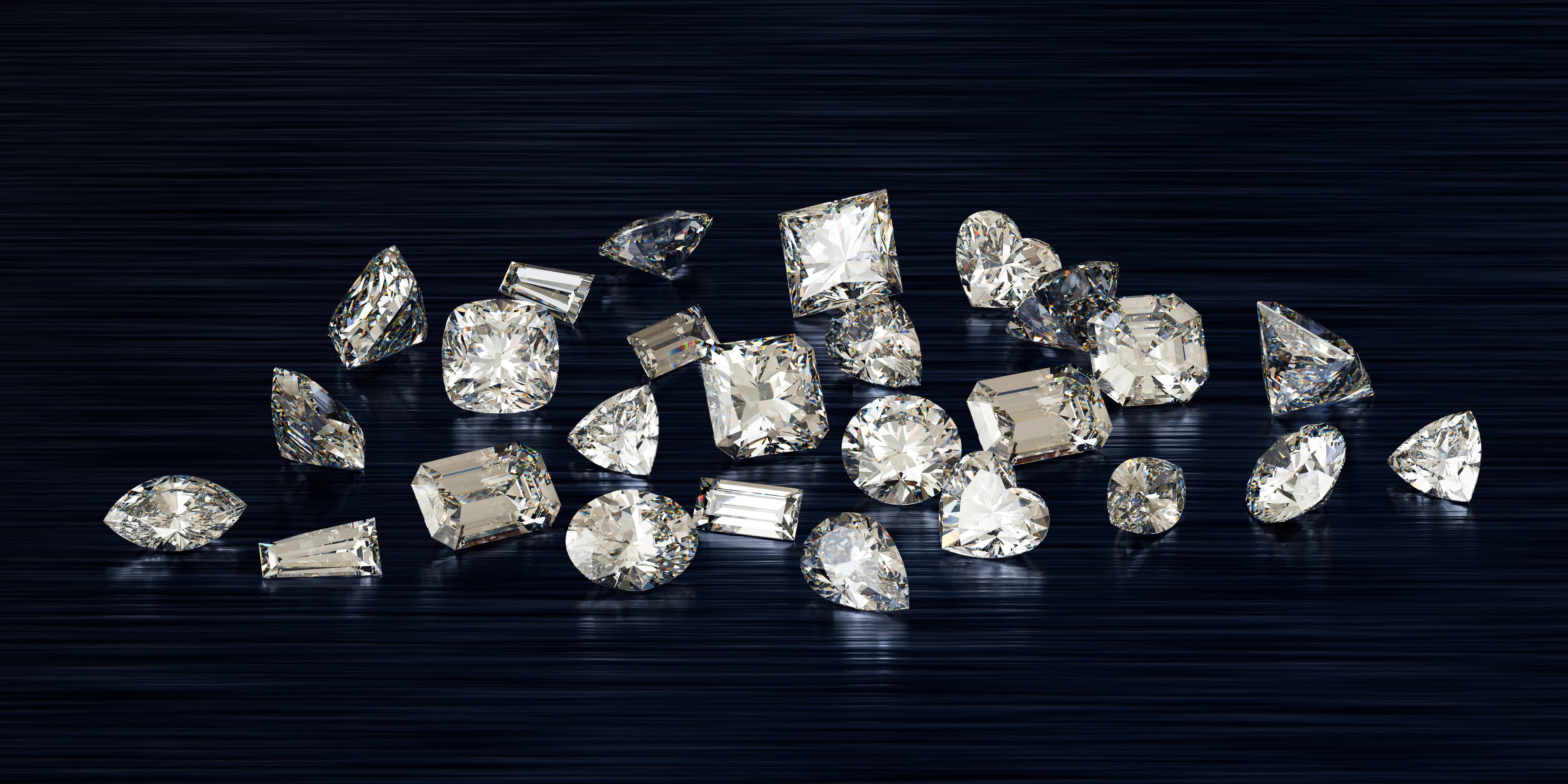 Fine tweezers holding a single round brilliant diamond